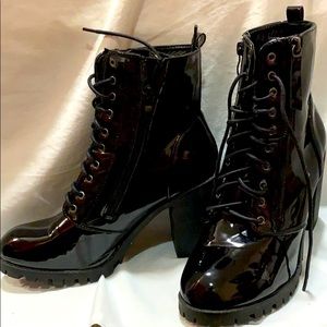 High heel shiny black lace up boots